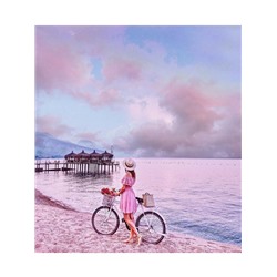 Девушка с велосипедом у моря